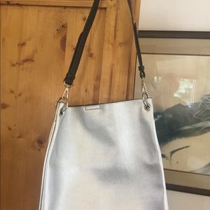 Silver vegan leather shoulder bag.